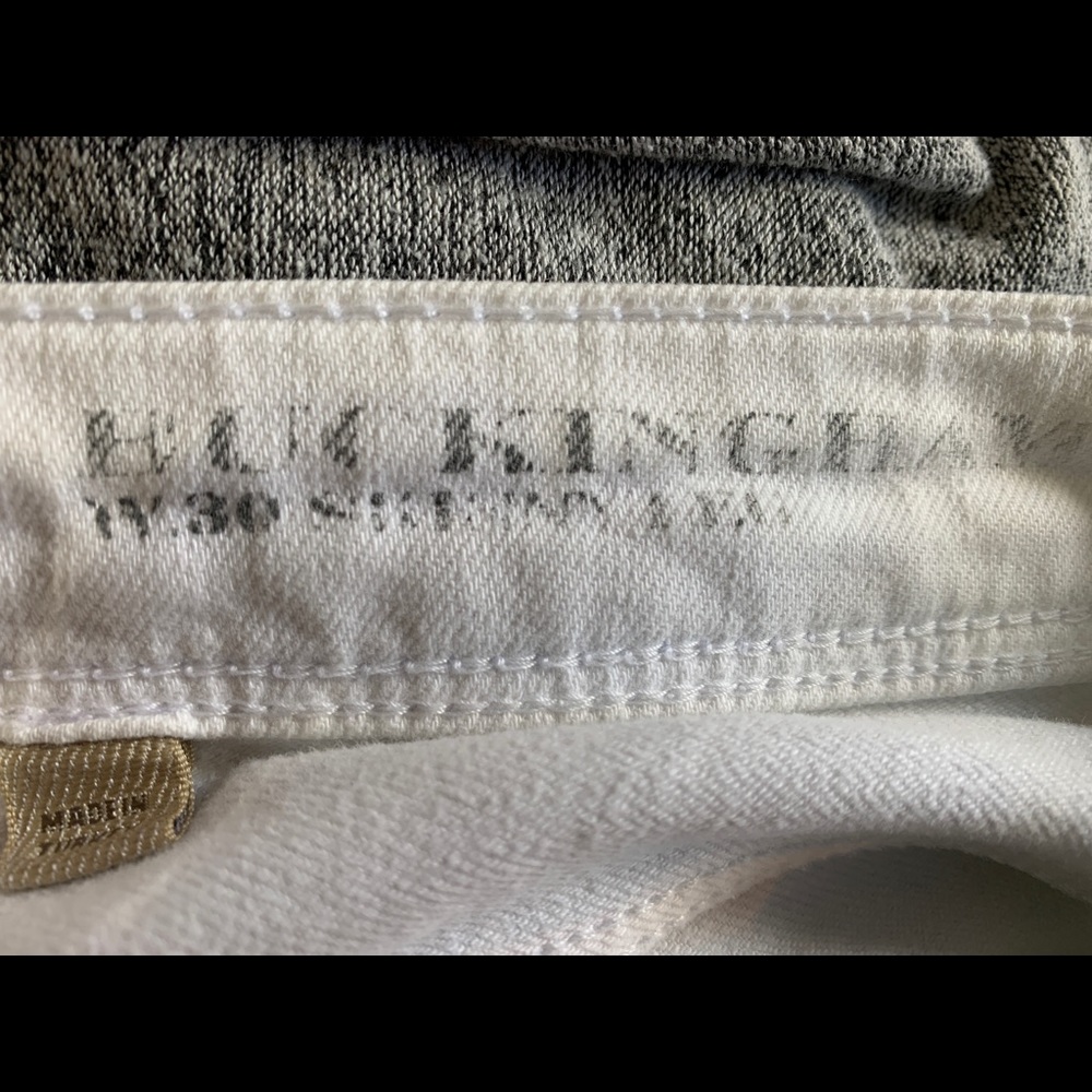 Burberry cropped white jeans.